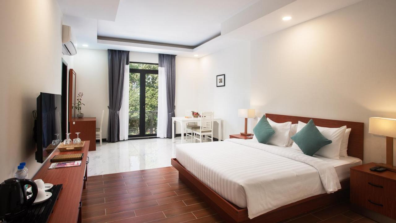 Angkor Sivutha Suites By Alfa Siem Reap Extérieur photo